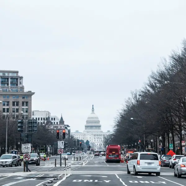 The US Capitol building visible from the street in Washington, D.C.