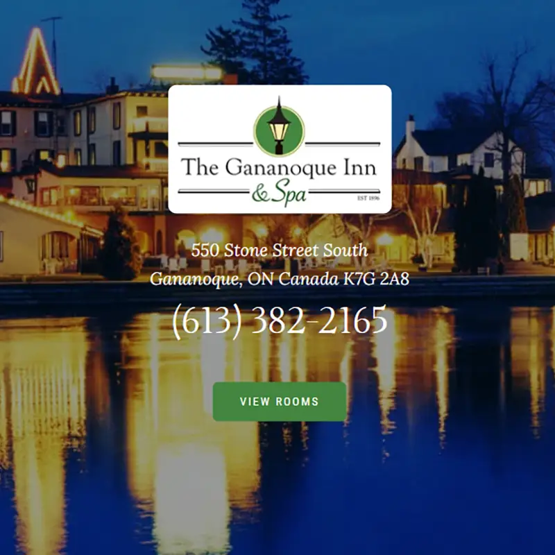 A banner for The Gananoque Inn & Spa with its address and phone number