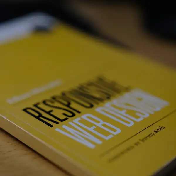 A yellow cover of the book Responsive Web Design representing mobile-optimized responsive website design
