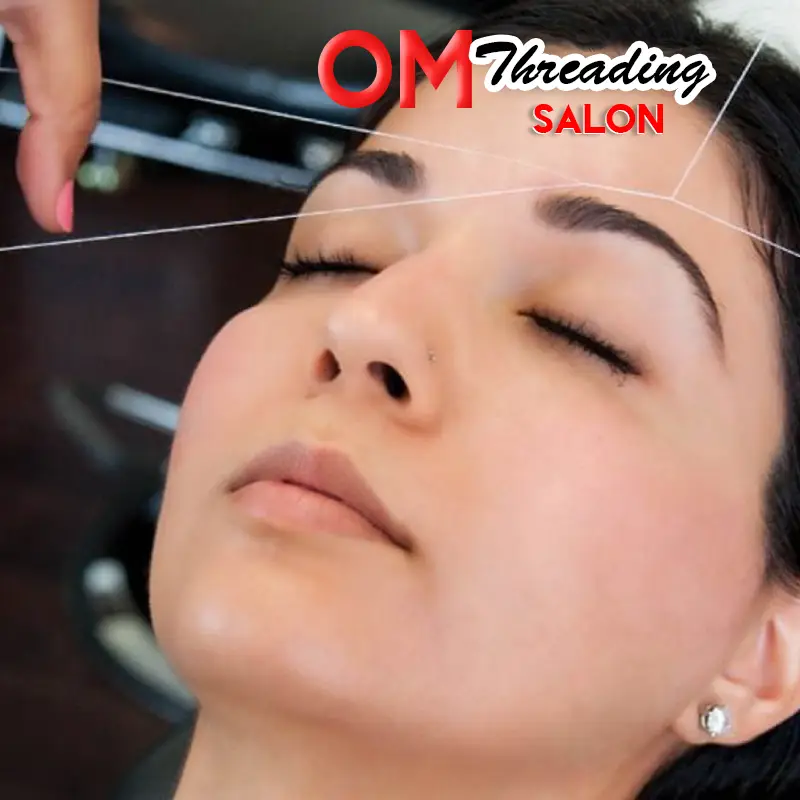A woman having her eyebrows threaded
